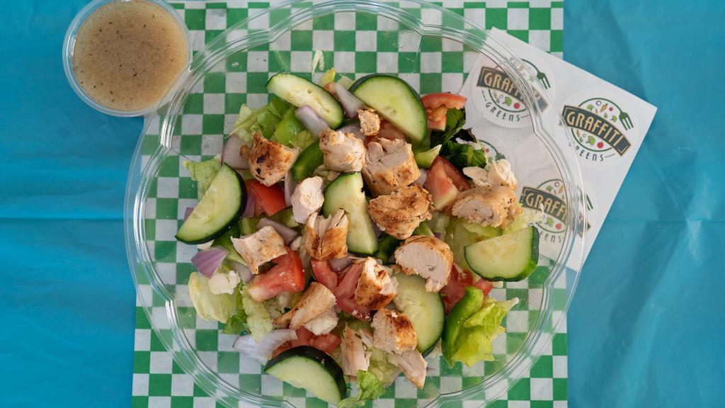 The Big Greek Salad · Fresh crisp romaine lettuce, sliced tomatoes, sliced green
bell pepper, green olives, sliced red onion, feta cheese crumbles, seasoned oregano, grilled marinated chicken, sliced cucumber, greek vinaigrette dressing. Variation: comes with one protein.