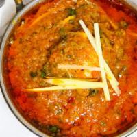 Chicken Curry · Chicken cooked traditional Indian curry.