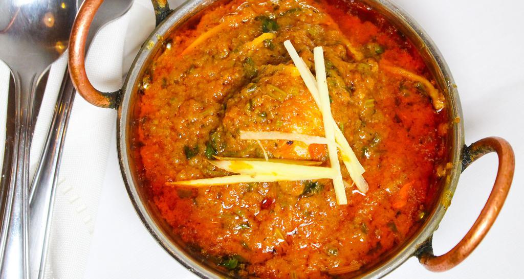 Chicken Curry · Chicken cooked traditional Indian curry.