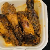 Jerk Chicken · Served with rice and peas or white rice. Your choice of fried plantains and steam veggie.