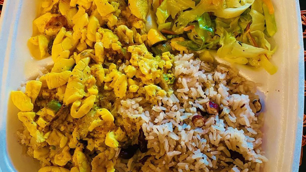 Ackee & Salt Fish · Served with rice and peas or white rice. Your choice of fried plantains and steam veggie.