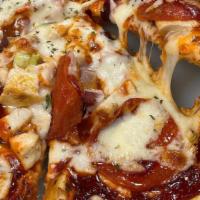 Chicken Bbq Pizza · Thin crust pizza loaded with Smoked BBQ Chicken,  Red Onions, Cheese and signature sauce. Ad...