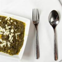 Saag · Creamy spinach, slow simmered and fragrant.