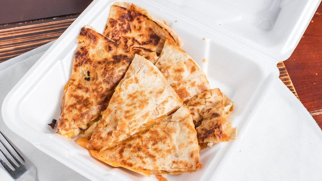 Caribbean Chicken Quesadilla - Full · Served with guacamole and sour cream.