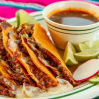Birria Quesabirria · Our famous shredded beef in a yellow corn tortilla stuffed with mozzarella cheese  served w ...