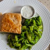 Spanakopita Plate · Vegetarian. Blend of fresh spinach, Parmesan, and feta cheese wrapped in delicate filo dough.