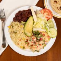 Camarones A La Crema · Shrimp cooked  in heavy cream served with salad avocado, cheese lemon, rice beans, and torti...