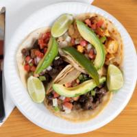 Mexican Tacos(Soft Tacos) · Popular Mexican food served on soft tortilla with choice of meat along with pico de gallo , ...