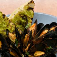 Mussels Marechiaro · tomatoes, white wine, garlic, herbs, grilled ciabatta