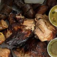Picada / Sampler Platter · Colombian cuisine prepared with chopped chicken, morcilla, chorizo, chicharrón, arepa, potat...