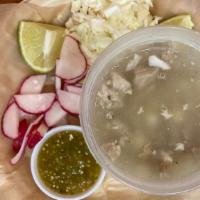 Large Pozole · Traditional pork pozole, topped with green cabbage, radishes, lime, and your choice of salsa...