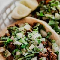Carne Asada  (After 11Am) · Served street style on a corn tortilla (flour available by request) with seasoned grilled sk...
