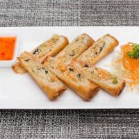 Spring Roll · Vegan. Crispy spring rolls filled with bean thread, cabbage, carrots, celery, and black mush...