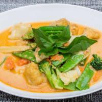 Panang Curry · I-Thai's favorites. Snow peas, kaffir lime leaves, Thai basil, and a peanut-red curry sauce.