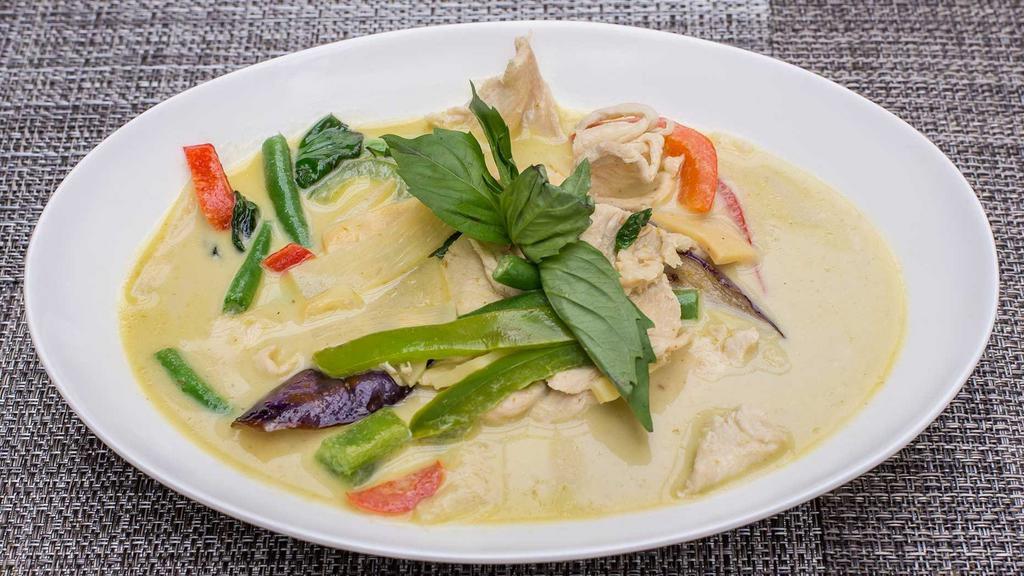 Green Curry · Bamboo shoots, eggplant, green beans, bell peppers, and Thai basil with a green curry sauce.