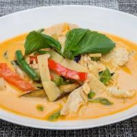 Red Curry · Red curry bamboo shoots, eggplant, green beans, bell peppers, and Thai basil with a red curr...