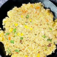 Signature Fried Rice · Fried rice with a choice of chicken, beef, shrimp, or tofu with peas and carrots, onion, and...