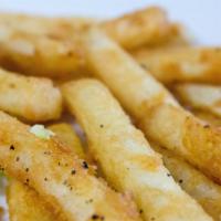 French Fries · Seasoned to perfection with salt and black pepper and served with ketchup  on the side.