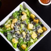 Caesar Salad (Small) · Romaine lettuce, croutons, black olives, Parmesan cheese. Included a side of Garlic Bread an...