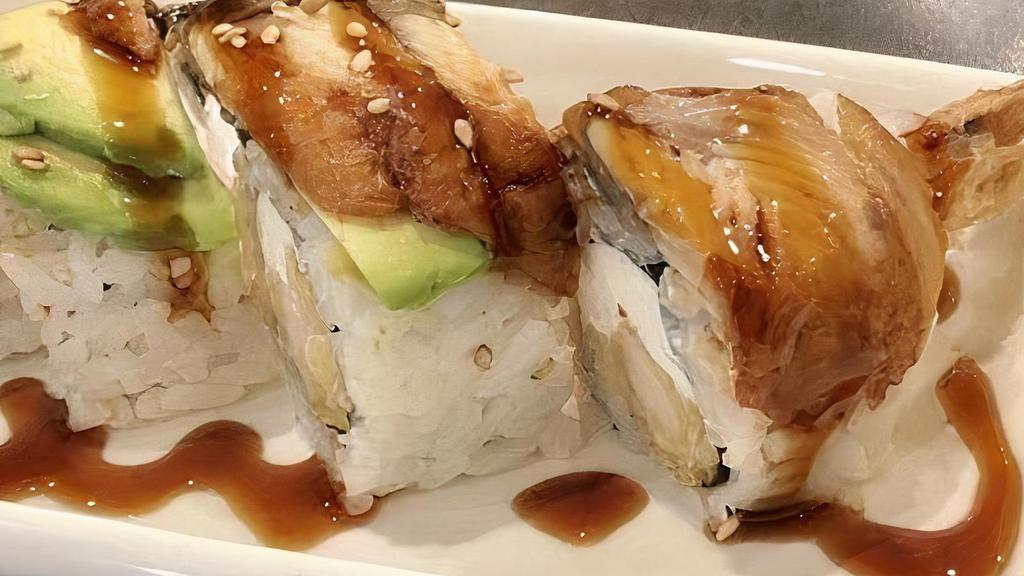Ninja Roll · Tempura shrimp and cream cheese topped with eel, avocado and ell sauce.
