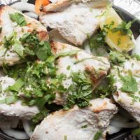 Malai Kabob · Tender boneless chicken breast, marinated in sour cream butter sauce with ginger, garlic and...