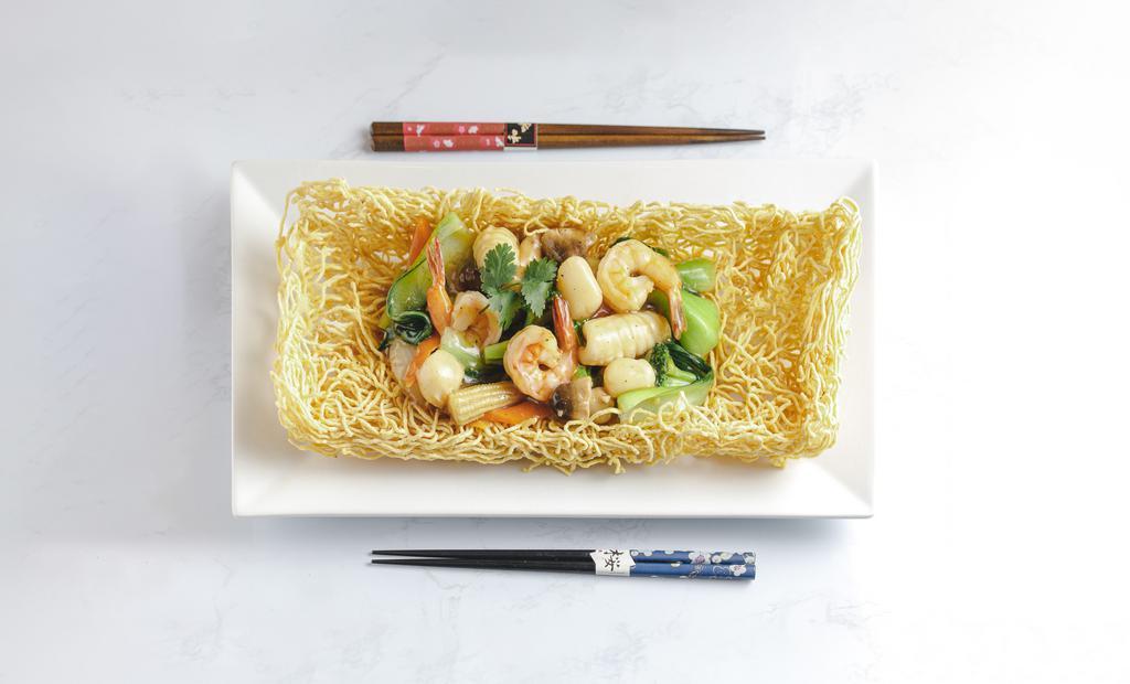 Crispy Eggs Noodle Seafood · Shrimp, scallop, calamari, white onion, bamboo, broccoli, baby corn, mushroom, bok choy, carrot