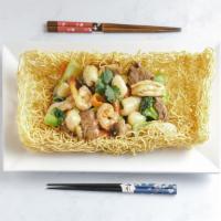 Crispy Eggs Noodle Combination · Shrimp, scallop, calamari, chicken, beef, white onion, bamboo, broccoli, baby corn, mushroom...