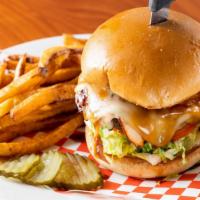 Elvis Presley Hawaiian Burger · Ham, swiss cheese, grilled pineapple, and teriyaki sauce.