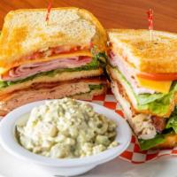 Club Sandwich · Turkey, bacon, ham, swiss and cheddar cheese, lettuce, tomato.