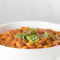 Channa(Chickpeas) · Vegan. Chick peas cooked in onion, ginger, garlic paste with Indian spices, and herbs. Serve...