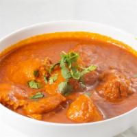 Dum Aloo · Vegan. Potatoes that are simmered in onion, and tomato gravy with Indian spices. Served with...