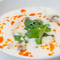 Tom Kha · Thai coconut milk soup with lemongrass, galangal mushroom, and cilantro.