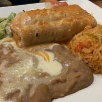 Combinations 8 · One enchilada, one tamale, rice, and beans.