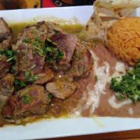 Pork - Puerco Carnitas Dinner · Pork tips. Served with rice, beans, tortillas and guacamole salad.