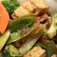 Stir Fry Veggie Over Steamed Rice ( Đồ Chay Xào) · Your choice of steamed rice or quinoa with new stir fry veggie dish of snow peas, broccoli, ...