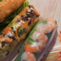 Combo Rolls (3 Cuốn) · An egg roll, spring roll and summer roll with sauces on the side
Spring roll has peanut sauce