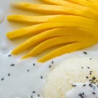 Coco Mango Sticky Rice · The traditional Thai dessert made with sticky rice, fresh mango and coconut milk, and eaten ...