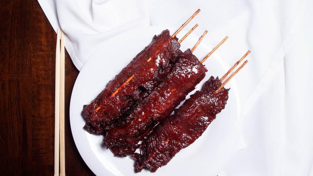 Teriyaki Combo · Flavorfully marinated beef or chicken on a stick; four pieces