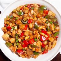 Kung Po Chicken And Peanuts · Cubes of white meat chicken with diced vegetables and spicy peppers, stir-fried quickly over...