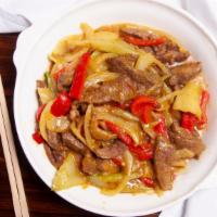 Beef Curry  · Tender sliced flank steak, celery, red peppers, and onions in a mildly spicy curry sauce