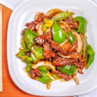 Beef Pepper · Generous slices of flank steak sautéed with green peppers and onions
