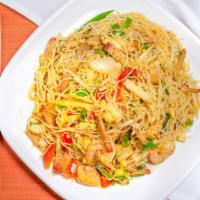 Singapore Noodles  · Thin rice noodles sautéed with petite shrimp, shredded chicken, roast pork, and julienne cur...