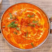 Tikka Masala (Butter Chicken) · Cooked with fresh tomato sauce.