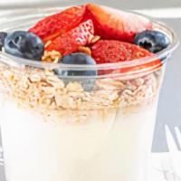 Yogurt/Fruit Parfait · Granola, Non Fat Vanilla Yogurt and sliced strawberries.