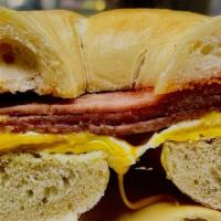 Taylor Ham, Egg And Cheese  · Taylor Ham, Egg & Cheese served on bagel, bread or roll of your choice.