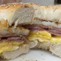 Hobo W/Taylor Ham · 2 Eggs, Taylor Ham, Hash Browns & Cheese on a Roll or Bagel of your choice.