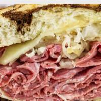 Reuben · Pastrami, sauerkraut, and melted Swiss on toasted rye with Russian dressing.