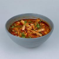 Tortilla Soup Bowl · Tortilla strips, pico de gallo, cotija