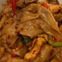 Drunken Noodles (Kee Mao) · Spicy. Wide rice noodles stir-fried with onions and tomatoes spicy basil sauce.