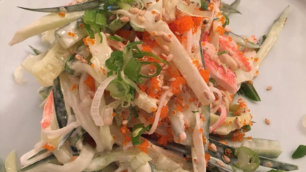 Crab Salad · Imitation crab meat, cucumber, fish roe, green scallions, mayo, and sesame seeds.